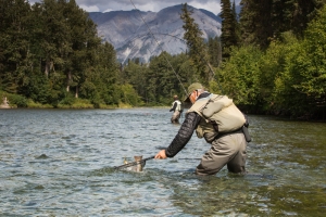 Photo of a Man Fly Fishing in Summer in Telluride, Colorado.