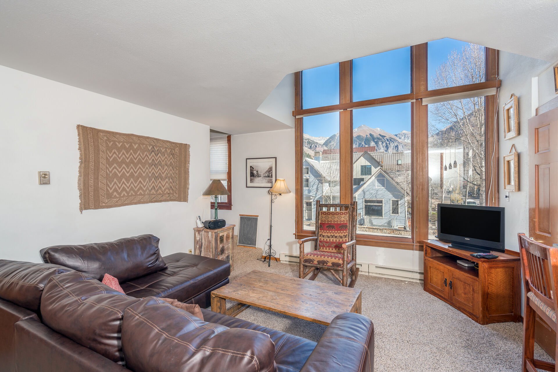 The living room of one of our downtown Telluride, Colorado winter rentals.